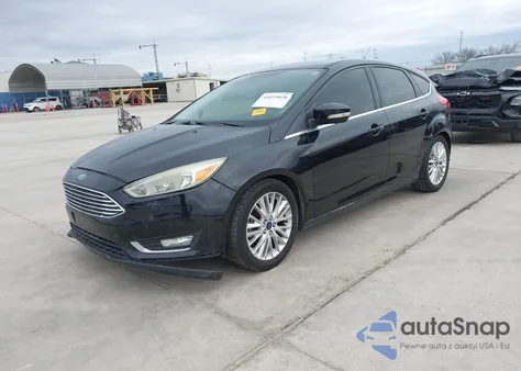 2015 Ford Focus Titanium z USA, uszkodzony, nr VIN 1FADP3N29FL347770